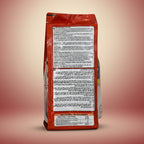 Close-up of a red package with printed text on a white background